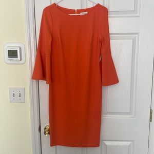 Calvin Klein size 8 orange dress with bell sleeves